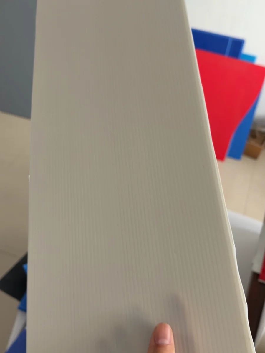 Close-up of a PP hollow sheet surface showing parallel flute direction
