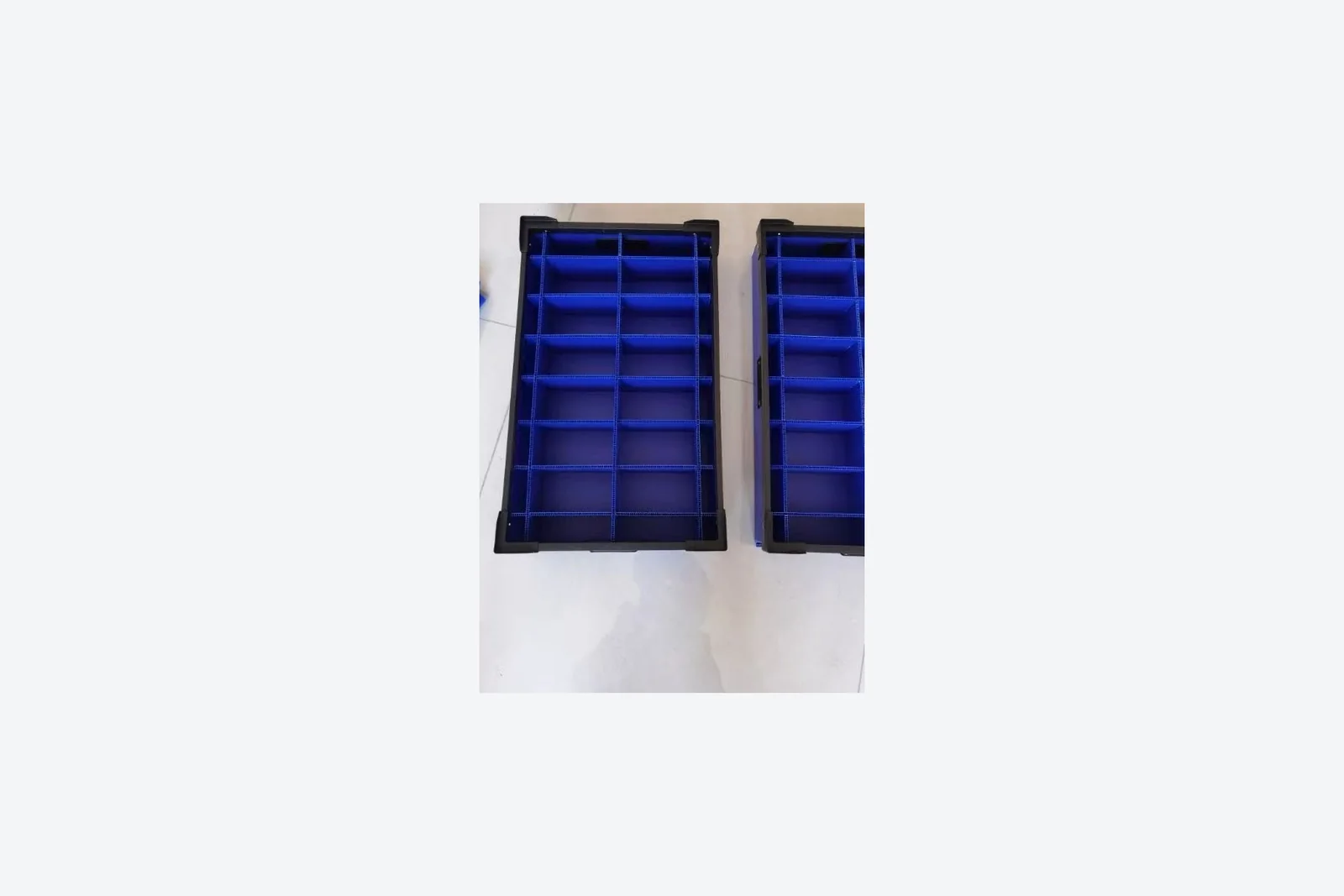 Two PP corrugated divider trays with different grid layouts