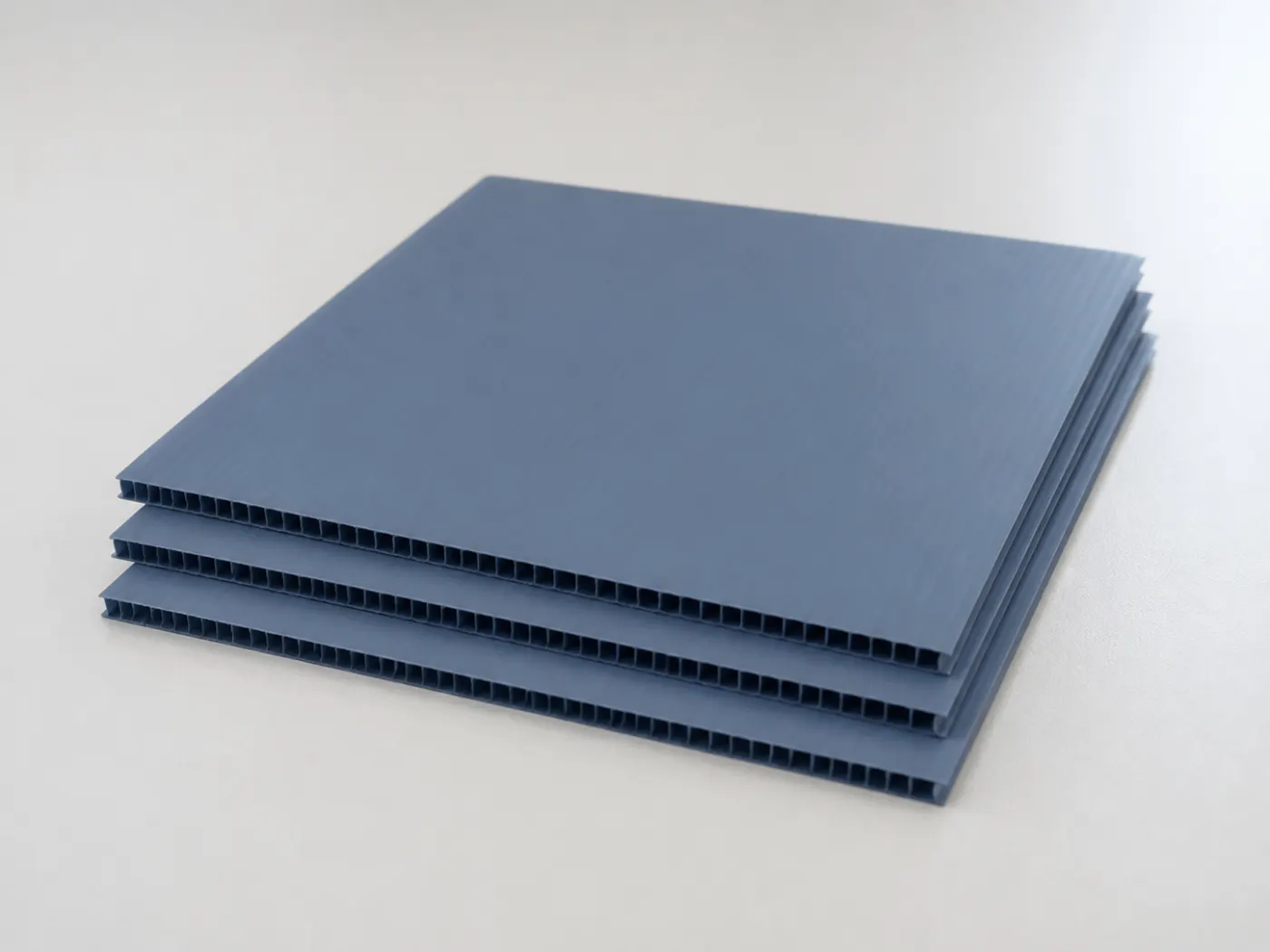Corrugated polypropylene layer pads prepared for industrial packaging
