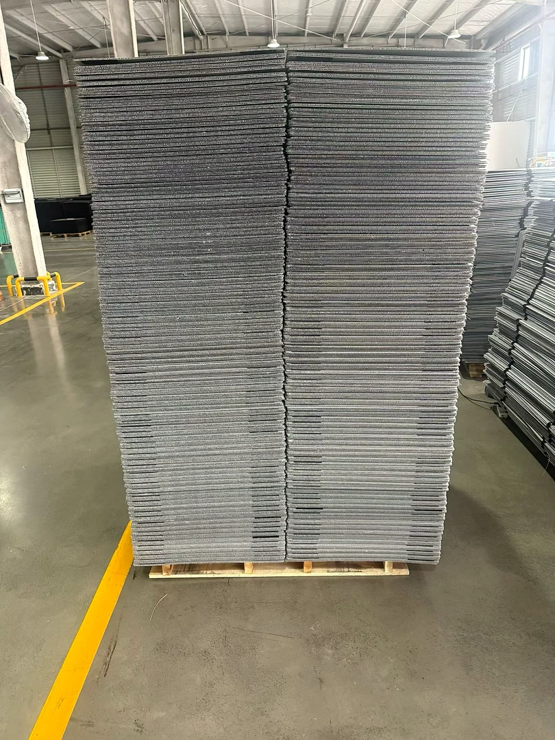 Stacked gray PP hollow sheet blanks prepared for packaging conversion