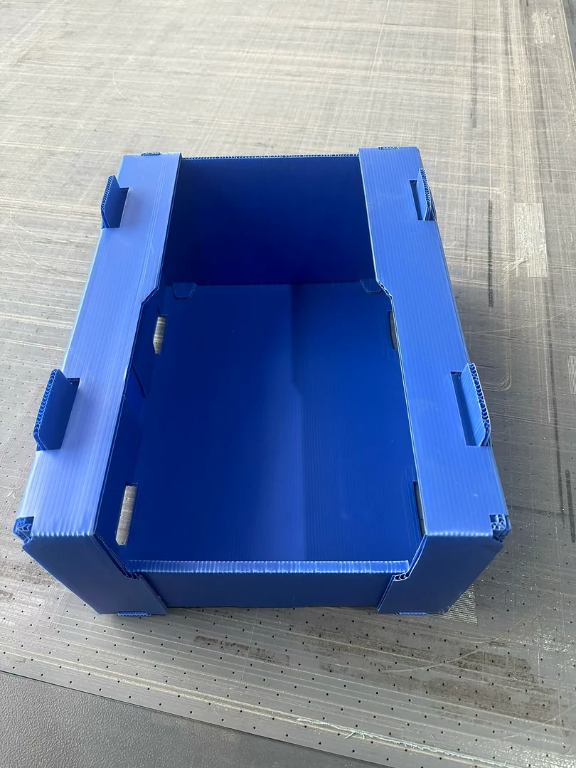 Blue PP corrugated returnable bin with reinforced rim and handholds