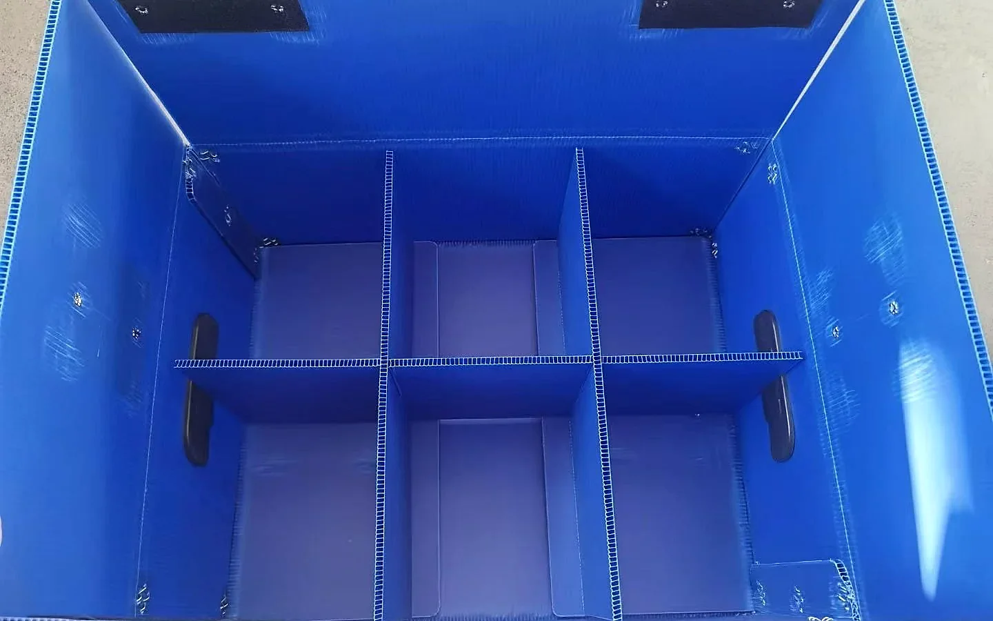 PP Divider System Blue corrugated polypropylene tote with an installed divider grid
