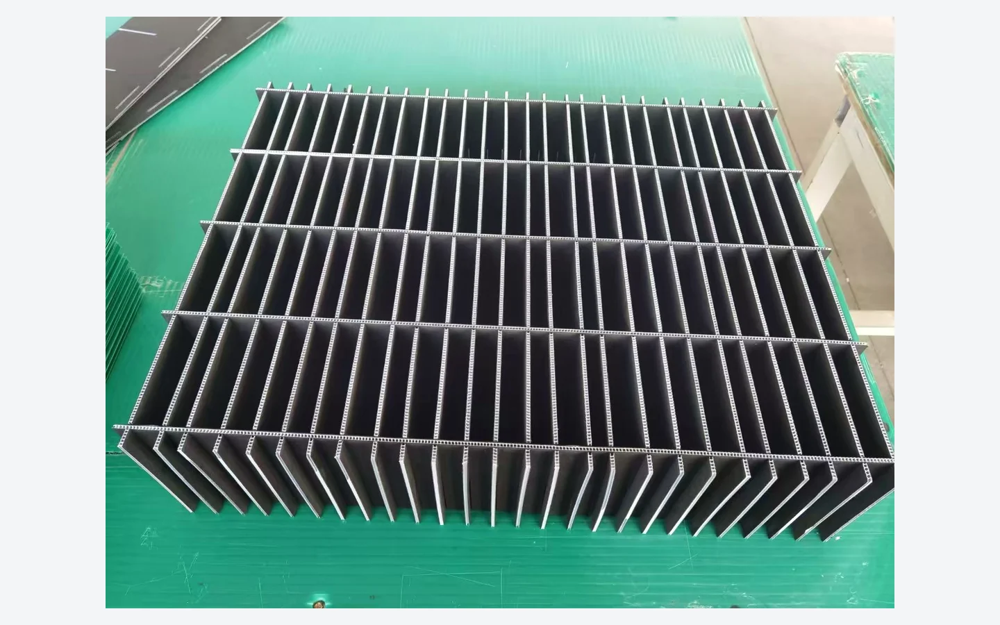 Black PP corrugated divider assembly for reusable product protection
