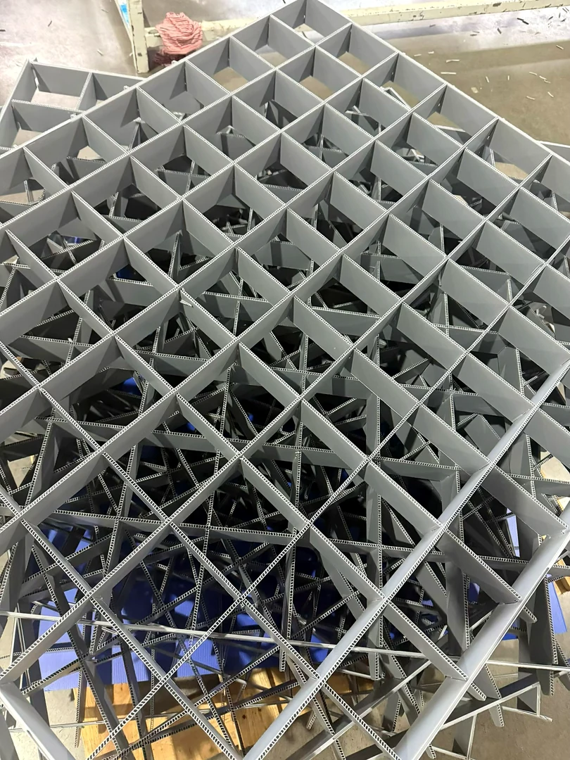 Gray PP corrugated divider components prepared for logistics and export packaging